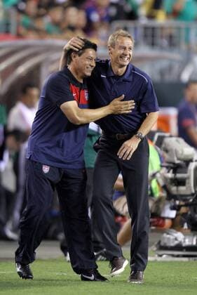 10 August 2011: USA head coach Jurgen Klinsmann (right) celebrates with assistant coach Martin Vazquez (left). The United States Men s National Team played the Mexico Men s National Team to a 1-1 tie at Lincoln Financial Field in Philadelphia, Pennsylvania in an international friendly soccer match. SOCCER: AUG 10 Mexico v USA Icon918110810019 EDITORIAL USE ONLY