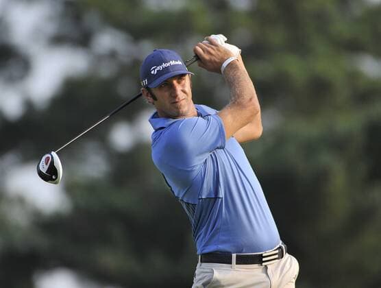 Dustin Johnson hits his tee shot on the 10th hole during the second round of the 93rd PGA Golf Herren Championship at the Atlanta Athletic Club on August 12, 2011 in Johns Creek, Georgia.  BKX2011081221