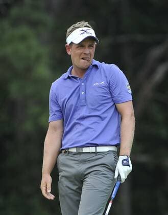Luke Donald of England reacts to his tee shot on the 2nd hole during the second round of the 93rd PGA Golf Herren Championship at the Atlanta Athletic Club on August 12, 2011 in Johns Creek, Georgia.  BKX2011081270