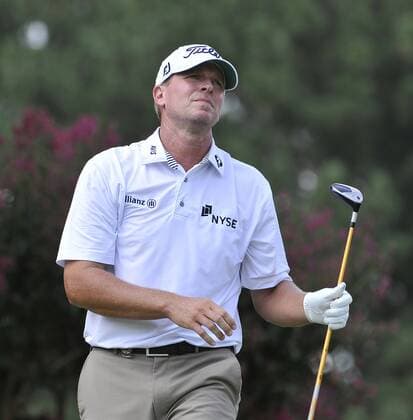 Steve Stricker reacts to his tee shot on the 8th hole during the second round of the 93rd PGA Golf Herren Championship at the Atlanta Athletic Club on August 12, 2011 in Johns Creek, Georgia.  BKX2011081278