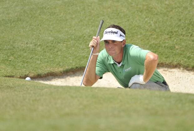 Keegan Bradley lines up his chip shot on the edge of the 1st green during the third round of the 93rd PGA Golf Herren Championship at the Atlanta Athletic Club on August 13, 2011 in Johns Creek, Georgia.  BKX2011081324