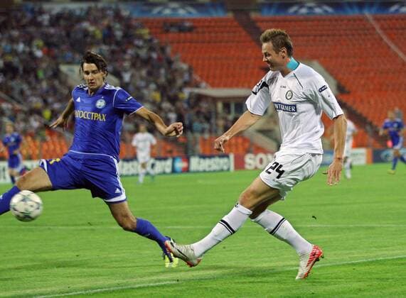 FUSSBALL - UEFA CL Play Off, Borisov vs Sturm MINSK,WEISSRUSSLAND,16.AUG.11 - FUSSBALL - UEFA Champions League, Play Off, FC BATE Borisow vs SK Sturm Graz. Bild zeigt Egor Filipenko (Borisov) und Roman Kienast (Sturm).