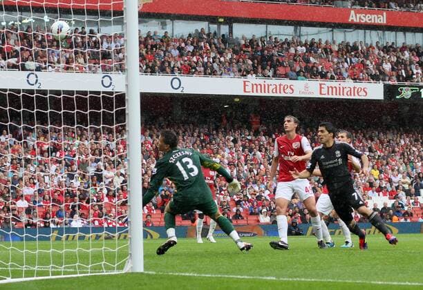 Arsenal s Aaron Ramsey scoring an own goal to put Liverpool 1-0 up Barclays Premier League, Arsenal FC London vs Liverpool FC. 20th August, 2011 EDITORIAL USE ONLY. No use with unauthorised audio, video, data, fixture lists, club league logos or live services. Online in-match use limited to 120 images, no video emulation. No use in betting, games or single club league player publications.