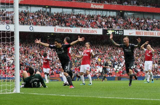 Arsenal s Aaron Ramsey looks on dejected after scoring an own goal to put Liverpool 1-0 up Barclays Premier League, Arsenal FC London vs Liverpool FC. 20th August, 2011 EDITORIAL USE ONLY. No use with unauthorised audio, video, data, fixture lists, club league logos or live services. Online in-match use limited to 120 images, no video emulation. No use in betting, games or single club league player publications.