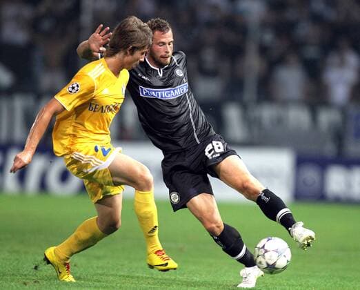 FUSSBALL - UEFA CL Play Off, Sturm vs Borisov GRAZ,AUSTRIA,24.AUG.11 - FUSSBALL - UEFA Champions League, Play Off, SK Sturm Graz vs FC BATE Borisow. Bild zeigt Dmitri Likhtarovic (Borisov) und Juergen Säumel (Sturm). 