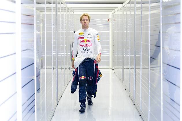 Sebastian VETTEL (GER), Red Bull Racing, geht durch den Boxenausgang, gehend, ganze Figur, Querformat, 1. Freie Training am 26.08.2011 Formel 1, Grosser Preis von Belgien in Spa Francorchamps