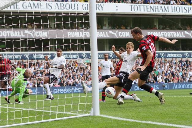 Manchester City s Edin Dzeko scoring his third goal. Barclays Premier League Tottenham Hotspur v Manchester City 28th August, 2011 EDITORIAL USE ONLY. No use with unauthorised audio, video, data, fixture lists, club league logos or live services. Online in-match use limited to 120 images, no video emulation. No use in betting, games or single club league player publications.