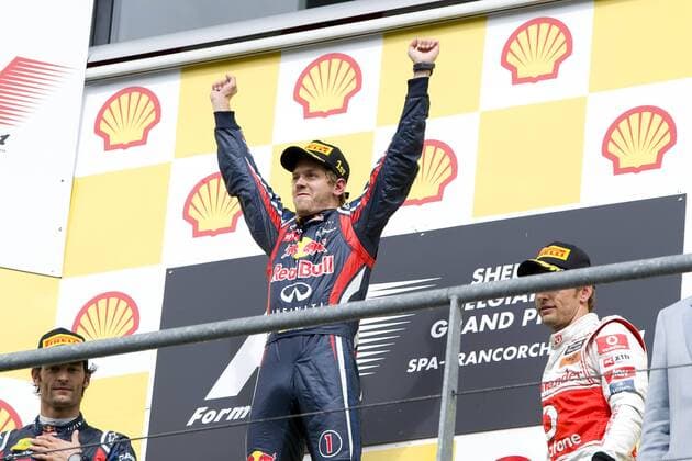 Siegerehrung in Belgien 2011, v.li. Mark Webber (Australien Red Bull), Sieger Sebastian Vettel (Deutschland Red Bull) und Jenson Button (England McLaren), Grosser Preis von Belgien in Spa Francorchamps vom 25.08. - 28.08. 2011, Saison2011, o0 Siegerehrung Jubel Freude Sieg, Sieger