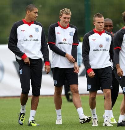 Englands Chris Smalling, Phil Jones and Tom Cleverley during training Training Training - England 30th August, 2011 EDITORIAL USE ONLY. No use with unauthorised audio, video, data, fixture lists, club league logos or live services. Online in-match use limited to 120 images, no video emulation. No use in betting, games or single club league player publications.