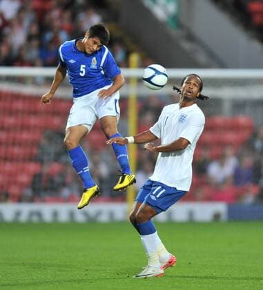01.09.2011 UEFA Under-21 Championship Qualifier from Vicarage Road. England U21 v Azerbaijan U21. Delfouneso is beaten in the air by Mammadov xStevexButlerx  ActionPlus11205185 Content restricted for UK based newspaper