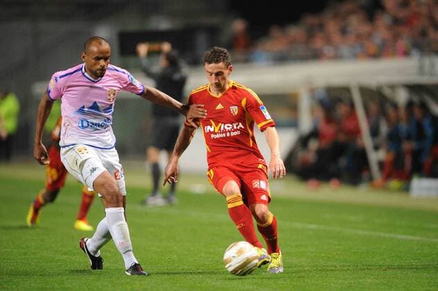 Julien Toudic (Lens) Aldo Angoula (Evian) Football : Racing Club LC Lens Evian Thonon Gaillard FC - Coupe de la Ligue - 01.09.2011 NLeGouic 