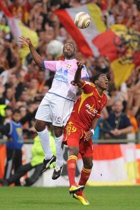 Geoffrey Kondogbia (Lens) Sidney Govou (Evian) Football : Racing Club LC Lens Evian Thonon Gaillard FC - Coupe de la Ligue - 01.09.2011 NLeGouic 
