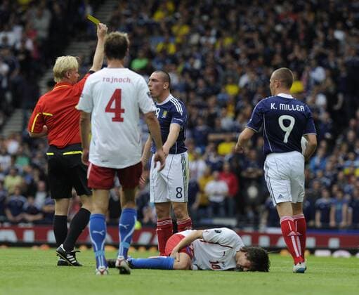 Scott Brown of Scotland receives the yellow card which means he misses the next match European Championship Qualifying Group I Scotland v Czech Republic 3rd September, 2011 EDITORIAL USE ONLY. No use with unauthorised audio, video, data, fixture lists, club league logos or live services. Online in-match use limited to 120 images, no video emulation. No use in betting, games or single club league player publications.