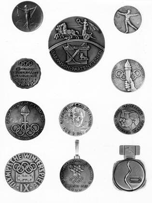 Winter Olympic Games medals. Column 1 (left), top-bottom: France, Chamonix 1924; USA, Lake Placid 1932; Norway, Oslo 1952; Austria, Innsbruck, 1964 Column 2 (middle), top-bottom: Germany, Garmisch 1936; Italy, Cortina D Ampezzo 1956; France, Grenoble 1968 Column 3 (right), top-bottom: Switzerland, St Moritz, 1928; Switzerland, St Moritz, 1948; USA, Squaw Valley, California 1960; Japan, Sapporo 1972 !AUFNAHMEDATUM GESCHÄTZT! UnitedArchives0720587
