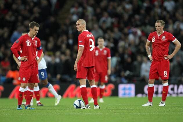 Wales Aaron Ramsey and Steve Morison look on dejected after going 1-0 down European Championship Qualifying Group G England v Wales 6th September, 2011 EDITORIAL USE ONLY. No use with unauthorised audio, video, data, fixture lists, club league logos or live services. Online in-match use limited to 120 images, no video emulation. No use in betting, games or single club league player publications.