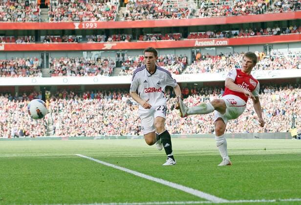 Arsenals Andrei Arshavin scoring his sides opening goal Barclays Premier League Arsenal FC v Swansea City 10th September, 2011 EDITORIAL USE ONLY. No use with unauthorised audio, video, data, fixture lists, club league logos or live services. Online in-match use limited to 120 images, no video emulation. No use in betting, games or single club league player publications.