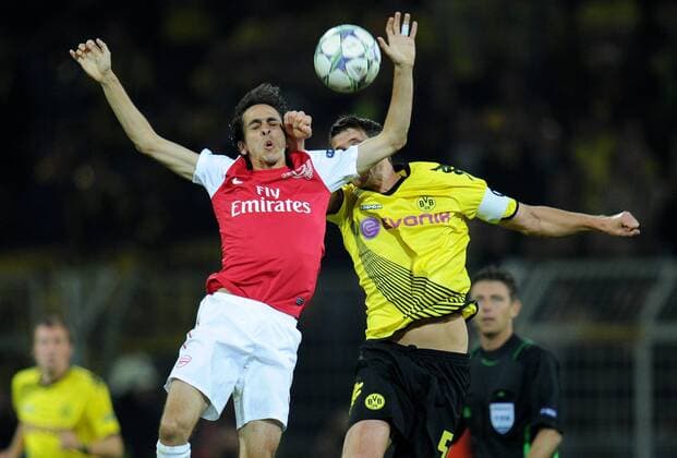 FUSSBALL CHAMPIONS LEAGUE SAISON 2011 2012, Borussia Dortmund (BVB) - Arsenal FC London 13.09.2011; Yossi BENAYOUN (li, Arsenal) gegen Sebastian KEHL (re, Dortmund)  BVB