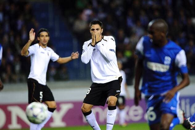 Mehmet Topal of Valencia (L) Victor Ruiz of Valencia (C) David Hubert of KRC Genk, KRC Genk - Valencia CF xVIxJackxJacobsxIVx 360714