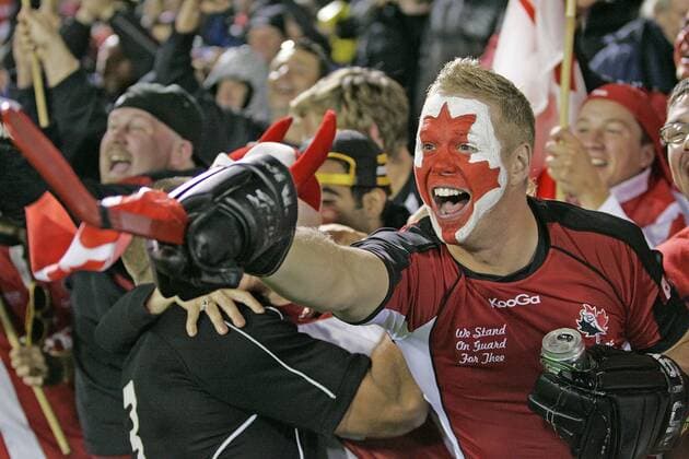 Rugby Union - Rugby World Cup 2011 - Canada fan celebrates with the players at the final whistle.  o0 Gesichtsbemalung Bemalung Landesfarben