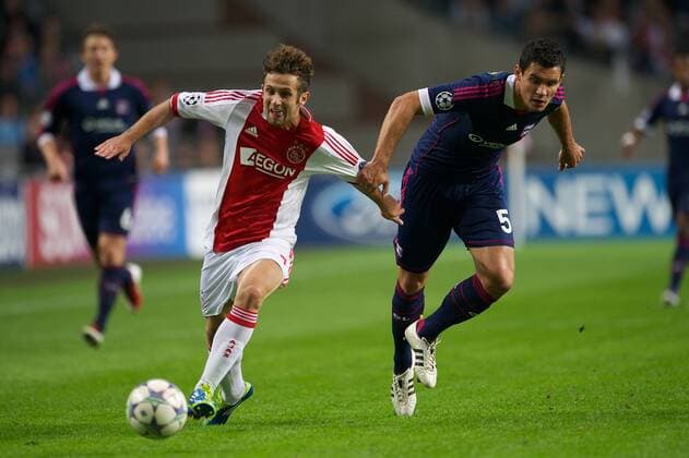 (L-R) Miralem Sulejmani of Ajax,Dejan Lovren of Olympique Lyon - Ajax Amsterdam vs. Olympique Lyonnais - UEFA Champions League 2011 2012 xVIxKarelxDelvoyex xOrangexPicturesxIVx 361309