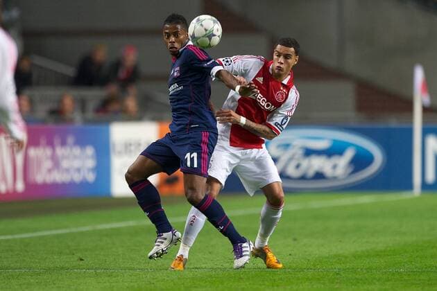 (L-R) Michel Bastos of Olympique Lyon,Gregory van der Wiel of Ajax - Ajax Amsterdam vs. Olympique Lyonnais - UEFA Champions League 2011 2012 xVIxKarelxDelvoyex xOrangexPicturesxIVx 361408