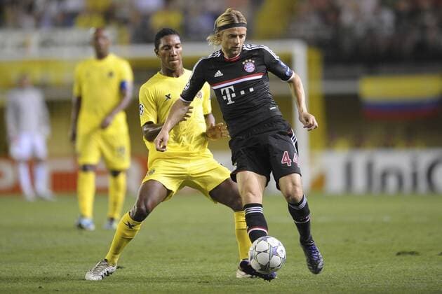 Sept. 14, 2011: Anatoliy Tymoshchuk player of Bayern and Jonathan De Guzman player of Villarreal, during the match between Villarreal CF and FC Bayern München, played at Madrigal stadium, Villarreal, Spain. 
