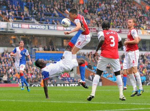 Christopher Samba of Blackburn Rovers overhead kick is blocked by Laurent Koscielny of Arsenal, R. Per Mertesacker - Premier League 2011 2012 - Blackburn Rovers vs. Arsenal FC London - 17th September, 2011 EDITORIAL USE ONLY. No use with unauthorised audio, video, data, fixture lists, club league logos or live services. Online in-match use limited to 120 images, no video emulation. No use in betting, games or single club league player publications.