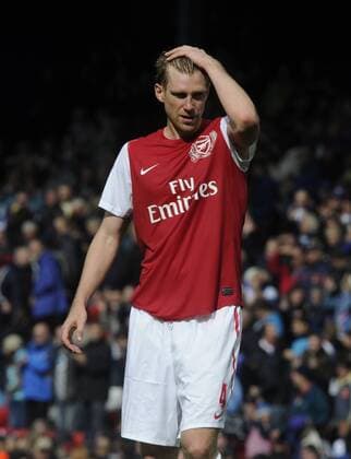 Per Mertesacker of Arsenal dejected Barclays Premier League - Blackburn Rovers vs. Arsenal FC London - 17th September, 2011 EDITORIAL USE ONLY. No use with unauthorised audio, video, data, fixture lists, club league logos or live services. Online in-match use limited to 120 images, no video emulation. No use in betting, games or single club league player publications.