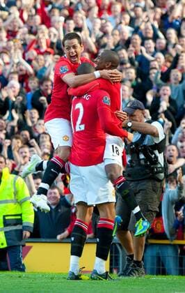 Chris Smaling of Manchester United celebrates his goal with Ashley Young of Manchester United and Javier CHICHARITO Hernandez of Manchester United Barclays Premier League - Manchester United (ManU) - Chelsea FC London - EDITORIAL USE ONLY. No use with unauthorised audio, video, data, fixture lists, club league logos or live services. Online in-match use limited to 120 images, no video emulation. No use in betting, games or single club league player publications.