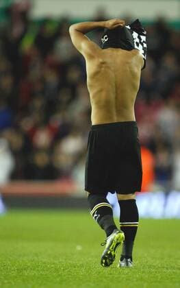 a dejected Massimo Luongo walks back after his penalty seals the win for Stoke Carling Cup Stoke City v Tottenham Hotspur 20th September, 2011 EDITORIAL USE ONLY. No use with unauthorised audio, video, data, fixture lists, club league logos or live services. Online in-match use limited to 120 images, no video emulation. No use in betting, games or single club league player publications.