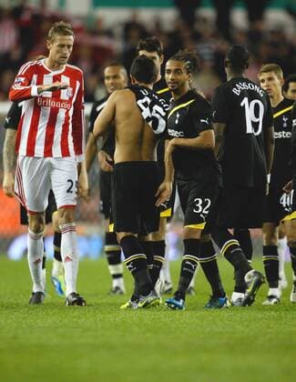 Stoke City s Peter Crouch consoles Massimo Luongo at the final whistle Carling Cup Stoke City v Tottenham Hotspur 20th September, 2011 EDITORIAL USE ONLY. No use with unauthorised audio, video, data, fixture lists, club league logos or live services. Online in-match use limited to 120 images, no video emulation. No use in betting, games or single club league player publications.