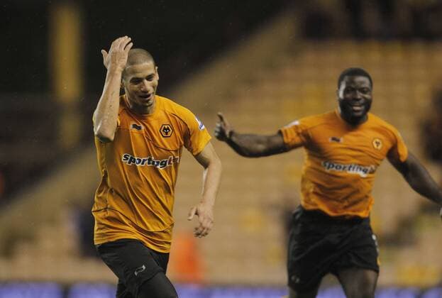 Adlene Guedioura of Wolverhampton Wanderers celebrates his magnificent goal, Wolves i5th of the game at Molineux Carling Cup Wolverhampton Wanderers v Millwall 20th September, 2011 EDITORIAL USE ONLY. No use with unauthorised audio, video, data, fixture lists, club league logos or live services. Online in-match use limited to 120 images, no video emulation. No use in betting, games or single club league player publications.