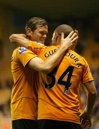 Adlene Guedioura of Wolverhampton Wanderers celebrates his magnificent goal with Richard Stearman ( Carling Cup Wolverhampton Wanderers v Millwall 20th September, 2011 EDITORIAL USE ONLY. No use with unauthorised audio, video, data, fixture lists, club league logos or live services. Online in-match use limited to 120 images, no video emulation. No use in betting, games or single club league player publications.