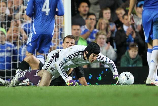 Chelseas Petr Cech goes off injured at half time after this tackle from Fulhams Orlando Sa, Chelsea FC London - Fulham FC EDITORIAL USE ONLY. No use with unauthorised audio, video, data, fixture lists, club league logos or live services. Online in-match use limited to 120 images, no video emulation. No use in betting, games or single club league player publications.