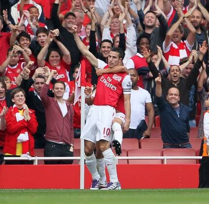 Arsenals Robin Van Persie celebrates scoring his sides opening goal Barclays Premier League Arsenal v Bolton Wanderers 24th September, 2011 EDITORIAL USE ONLY. No use with unauthorised audio, video, data, fixture lists, club league logos or live services. Online in-match use limited to 120 images, no video emulation. No use in betting, games or single club league player publications.