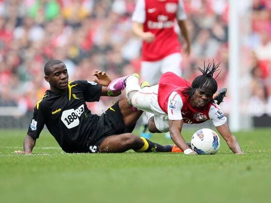 Arsenals Gervinho tussles with Boltons Fabrice Muamba Barclays Premier League Arsenal v Bolton Wanderers 24th September, 2011 EDITORIAL USE ONLY. No use with unauthorised audio, video, data, fixture lists, club league logos or live services. Online in-match use limited to 120 images, no video emulation. No use in betting, games or single club league player publications.