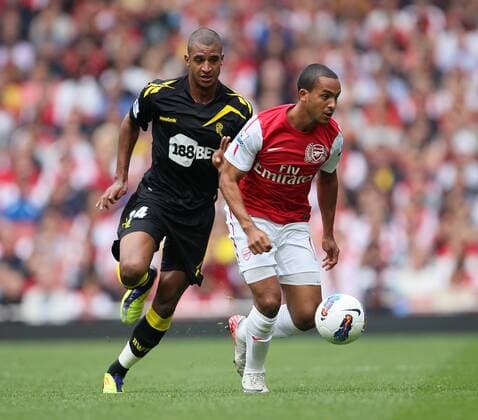 Arsenals Theo Walcott tussles with Boltons David N Gog Barclays Premier League Arsenal v Bolton Wanderers 24th September, 2011 EDITORIAL USE ONLY. No use with unauthorised audio, video, data, fixture lists, club league logos or live services. Online in-match use limited to 120 images, no video emulation. No use in betting, games or single club league player publications.