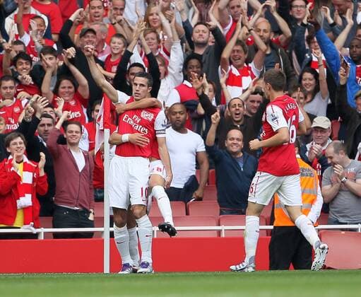 Arsenals Robin Van Persie celebrates scoring his sides opening goal Barclays Premier League Arsenal v Bolton Wanderers 24th September, 2011 EDITORIAL USE ONLY. No use with unauthorised audio, video, data, fixture lists, club league logos or live services. Online in-match use limited to 120 images, no video emulation. No use in betting, games or single club league player publications.