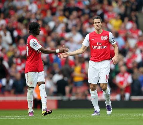 Arsenals Robin Van Persie celebrates scoring his sides opening goal Barclays Premier League Arsenal v Bolton Wanderers 24th September, 2011 EDITORIAL USE ONLY. No use with unauthorised audio, video, data, fixture lists, club league logos or live services. Online in-match use limited to 120 images, no video emulation. No use in betting, games or single club league player publications.
