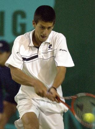 04.02.2004 Belgrade(Serbia) Gemax Open challenger Novak Djokovic :Stringer in cooperation with 