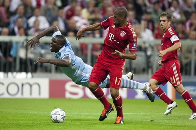 Micah RICHARDS, Manchester City, Jerome BOATENG, Philipp LAHM, Bayern. Fussball, Champions League, FC Bayern (FCB) - Manchester City (MCT) Gruppe A Gruppenphase 2. Spieltag am 27.09.2011 in München (München) Deutschland. Â