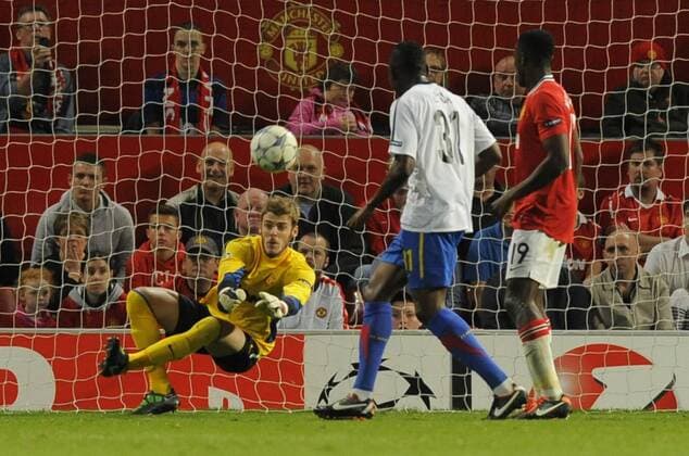 David De Gea of Manchester United blocks a shot which leads to the first goal by FC Basel UEFA Champions League Group C, Manchester United (ManU) - FC Basel EDITORIAL USE ONLY. No use with unauthorised audio, video, data, fixture lists, club league logos or live services. Online in-match use limited to 120 images, no video emulation. No use in betting, games or single club league player publications.