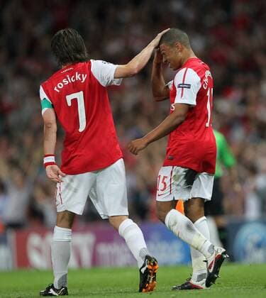 Arsenals Alex Oxlade-Chamberlain celebrates scoring his sides opening goal with Tomas Rosicky UEFA Champions League Group F, Arsenal FC London --- Olympiakos Piräus EDITORIAL USE ONLY. No use with unauthorised audio, video, data, fixture lists, club league logos or live services. Online in-match use limited to 120 images, no video emulation. No use in betting, games or single club league player publications.