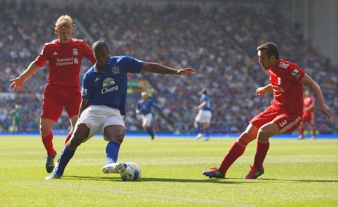 Barclays Premier League Everton FC vs. Liverpool FC 1st October, 2011 - Sylvain Distin (C), Dirk Kuyt (L) and Jose Enrique - EDITORIAL USE ONLY. No use with unauthorised audio, video, data, fixture lists, club league logos or live services. Online in-match use limited to 120 images, no video emulation. No use in betting, games or single club league player publications.