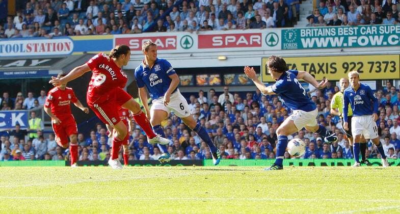 Liverpool s Andy Carroll scores the opening goal Barclays Premier League Everton FC vs. Liverpool FC 1st October, 2011 EDITORIAL USE ONLY. No use with unauthorised audio, video, data, fixture lists, club league logos or live services. Online in-match use limited to 120 images, no video emulation. No use in betting, games or single club league player publications.