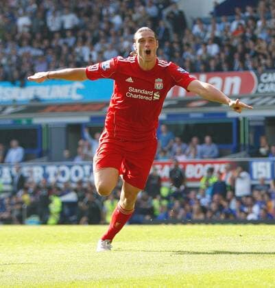 Andy Carroll celebrates his goal v Everton Barclays Premier League Everton FC vs. Liverpool FC 1st October, 2011 EDITORIAL USE ONLY. No use with unauthorised audio, video, data, fixture lists, club league logos or live services. Online in-match use limited to 120 images, no video emulation. No use in betting, games or single club league player publications.