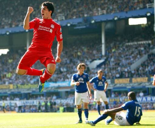 Liverpool s Luis Suarez celebrates his goal Barclays Premier League Everton FC vs. Liverpool FC 1st October, 2011 EDITORIAL USE ONLY. No use with unauthorised audio, video, data, fixture lists, club league logos or live services. Online in-match use limited to 120 images, no video emulation. No use in betting, games or single club league player publications.