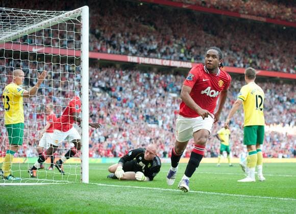 Anderson of Manchester United turns to celebrate scoring the first goal Barclays Premier League Manchester United v Norwich City 1st October, 2011 EDITORIAL USE ONLY. No use with unauthorised audio, video, data, fixture lists, club league logos or live services. Online in-match use limited to 120 images, no video emulation. No use in betting, games or single club league player publications.
