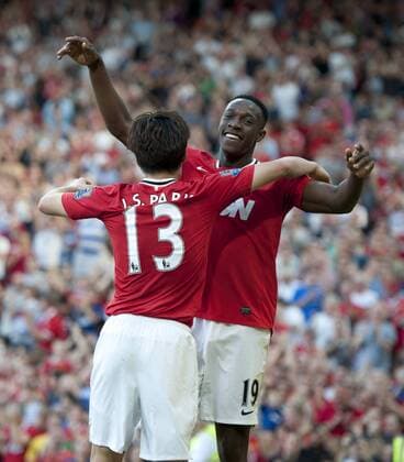 Danny Welbeck of Manchester United celebrates scoring with Park Ji-Sung of Manchester United Barclays Premier League Manchester United v Norwich City 1st October, 2011 EDITORIAL USE ONLY. No use with unauthorised audio, video, data, fixture lists, club league logos or live services. Online in-match use limited to 120 images, no video emulation. No use in betting, games or single club league player publications.
