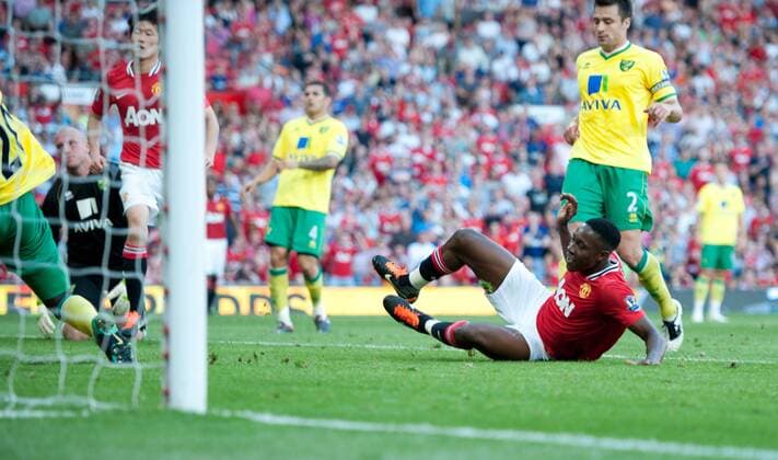Danny Welbeck of Manchester United slides in to score the second goal Barclays Premier League Manchester United v Norwich City 1st October, 2011 EDITORIAL USE ONLY. No use with unauthorised audio, video, data, fixture lists, club league logos or live services. Online in-match use limited to 120 images, no video emulation. No use in betting, games or single club league player publications.